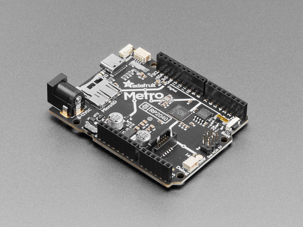 Adafruit Metro RP2040 - Choo! Choo! This is the RP2040 Metro Line, making all station stops at "Dual Cortex M0+ mountain", "264K RAM round-about" and "16 Megabytes of Flash town".