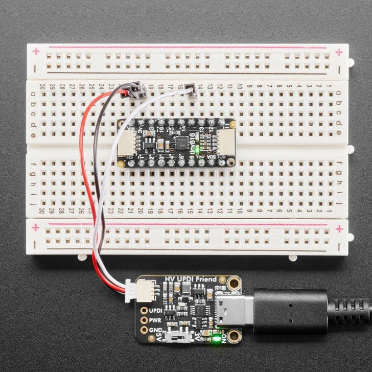 Adafruit High Voltage UPDI Friend - USB Serial UPDI Programmer - UPDI stands for Unified Program and Debug Interface, but this board is so smol and cute that we will call it the Unusually Playful Device Interfacer and pat its head when it does a good job.