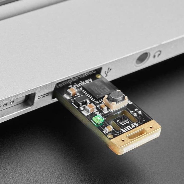 Adafruit SHT45 Trinkey - USB Temperature and Humidity Sensor - It's half USB Key, half temperature-humidity sensor... it's the Adafruit SHT45 Trinkey. We wanted to make it super-easy to add one of our most popular combination environmental sensors to any computer with a USB A port.