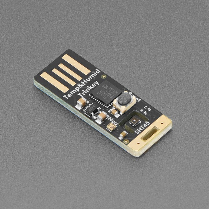 Adafruit SHT45 Trinkey - USB Temperature and Humidity Sensor with PTFE - It's half USB Key, half temperature-humidity sensor... it's the Adafruit SHT45 Trinkey with a PTFE filter.