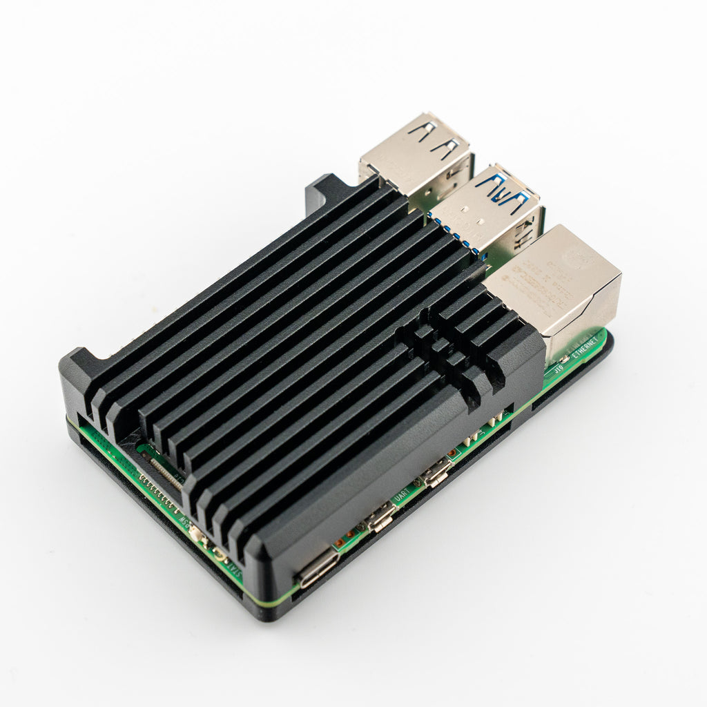 Aluminium Heatsink Case for Raspberry Pi 5 - Why use a heatsink and a case, when you can use a heatsink case?! This sleek, anodised aluminium case for Raspberry Pi 5 will give you 10-15°C of passive cooling under full CPU load. Pretty cool.