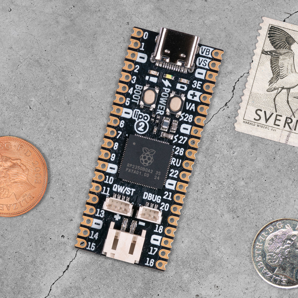 Pimoroni Pico LiPo 2 - A top of the line Pirate-brand RP2350-powered board with 16MB of flash storage, 8MB of PSRAM, USB-C, Qw/ST and built in LiPo charging.