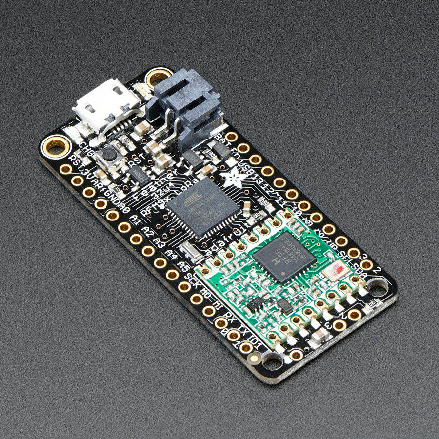 Adafruit Feather 32u4 RFM96 LoRa Radio - 433MHz - RadioFruit - This is the Adafruit Feather 32u4 LoRa Radio (RFM9x). They're called RadioFruits, Adafruits take on an microcontroller with a "Long Range (LoRa)" packet radio transceiver with built in USB and battery charging.