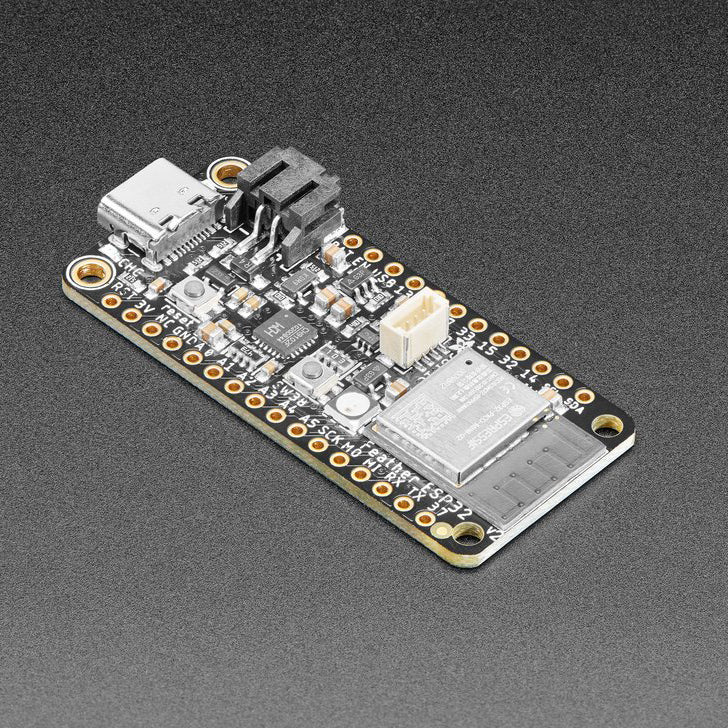 Adafruit ESP32 Feather V2 - 8MB Flash + 2 MB PSRAM - One of our star Feathers is the Adafruit HUZZAH32 ESP32 Feather - with the fabulous ESP32 WROOM module on there, it makes quick work of WiFi and Bluetooth projects that take advantage of Espressifs most popular chipset.