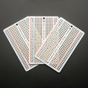 An image of Adafruit Perma-Proto Breadboard PCB - 3 Pack!