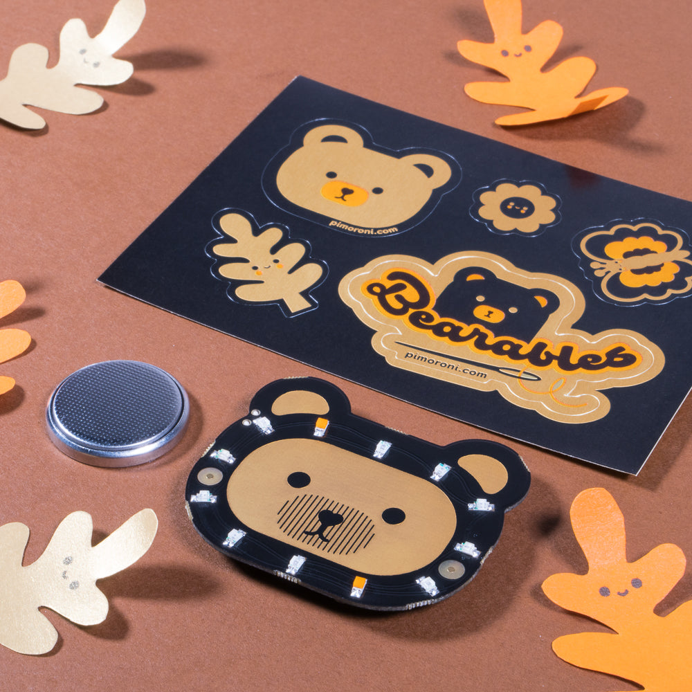 Bearables Bear LED Badge - A bewildered bear badge with 12 coloured LEDs and 12 light patterns, that's sewable, hackable, wearable, and adorable!