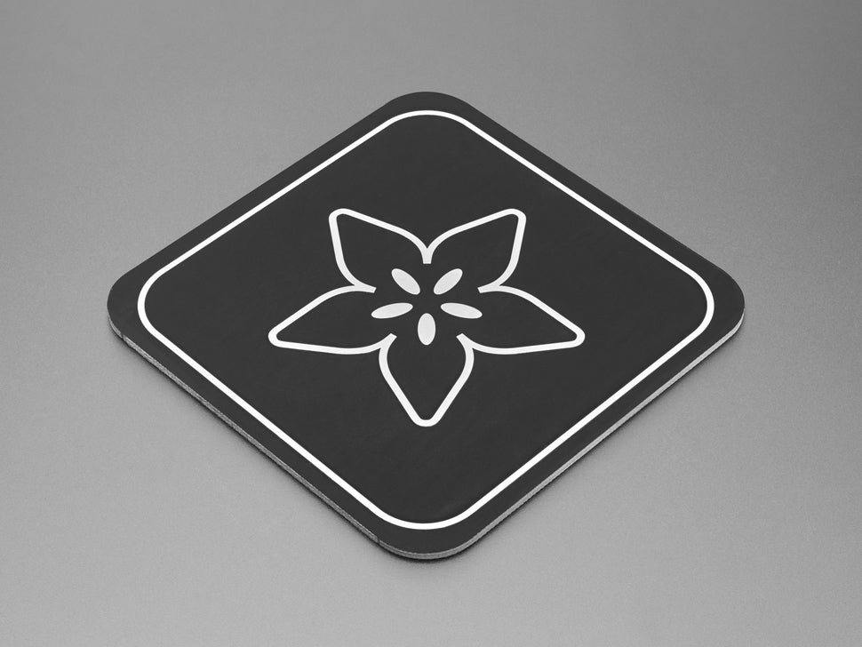Aluminum PCB Coaster with Adafruit Logo - You've been burning the midnight oil cobbling your latest maker project. Wait, what time is it?