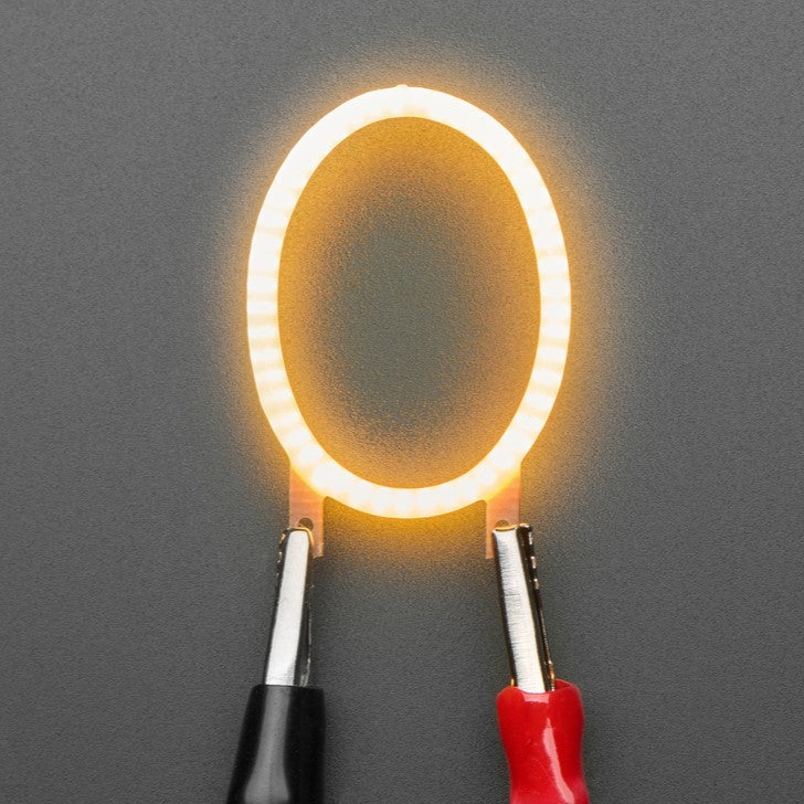 Number LED Filament - This warm-white glowy number is made out of COB (chip on board) LEDs, often seen in 'Edison-like' LED bulbs, arranged in different patterns to give a bright, warm lighting effect.