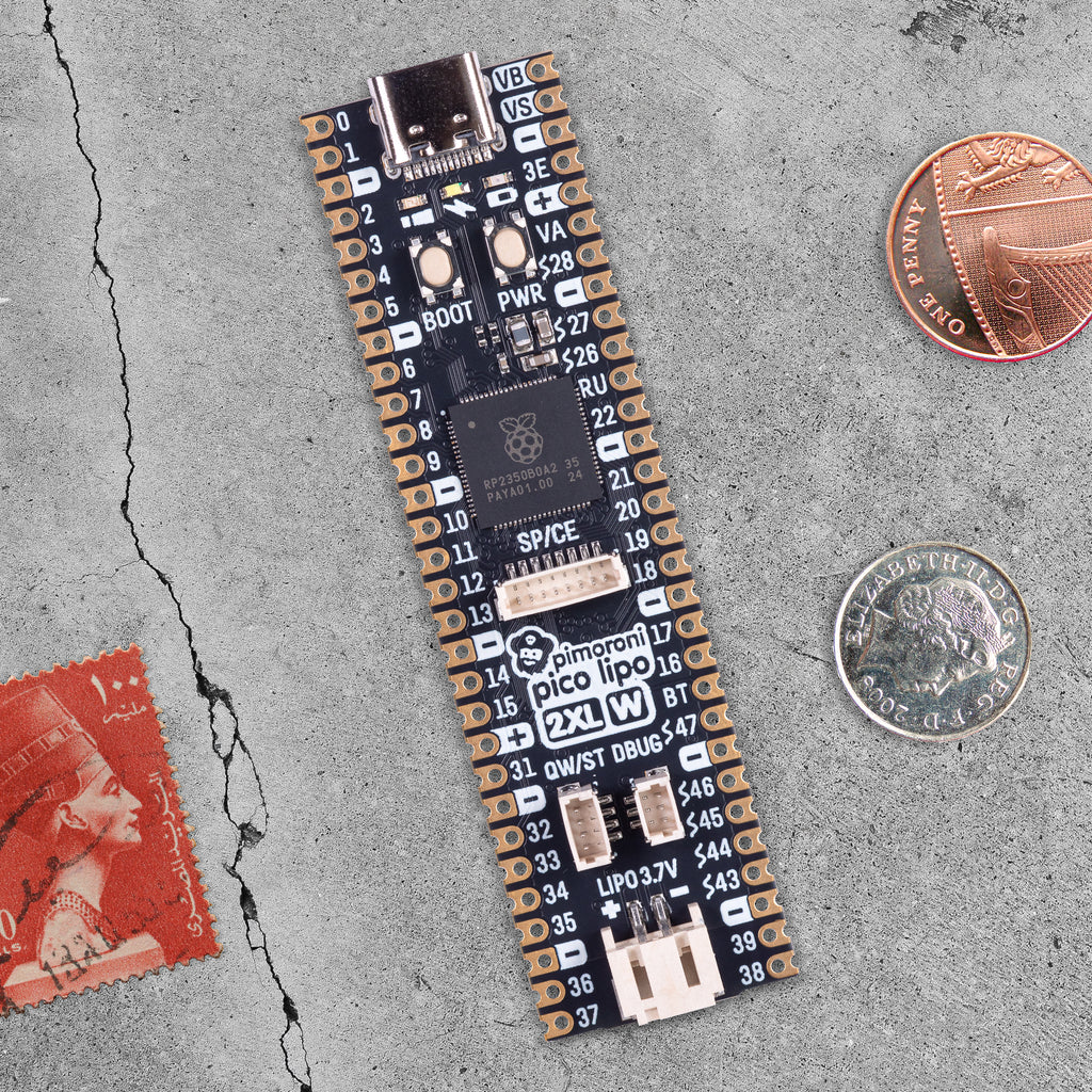 Pimoroni Pico LiPo 2 XL W - An elongated Pirate-brand RP2350-powered board with 16MB of flash, 8MB of PSRAM, USB-C, Qw/ST, 2.4GHz wireless / Bluetooth and built-in LiPo charging.