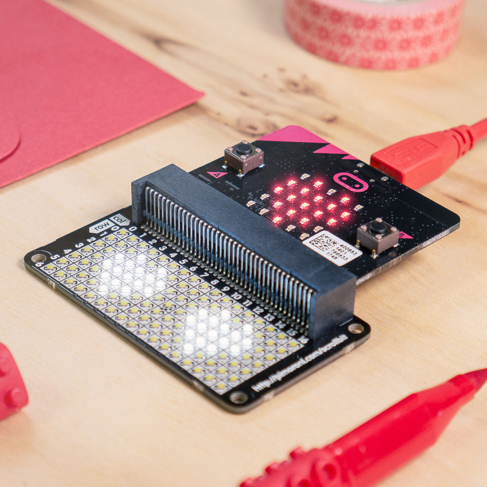 scroll:bit - scroll:bit is a little display with a lot of pixels! Its 119 bright white LEDs are perfect for scrolling messages with your micro:bit, or for animations, graphs, and more!
